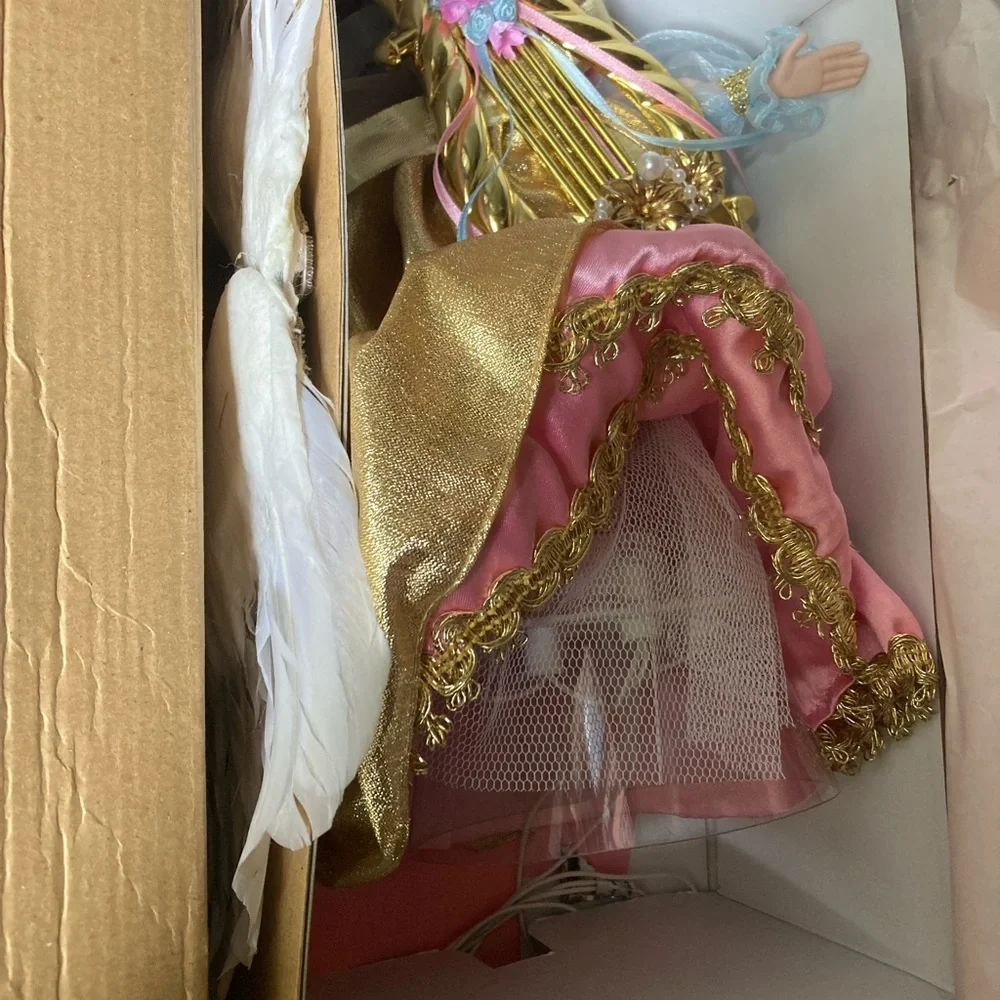 Gold and Pink Collectible Doll